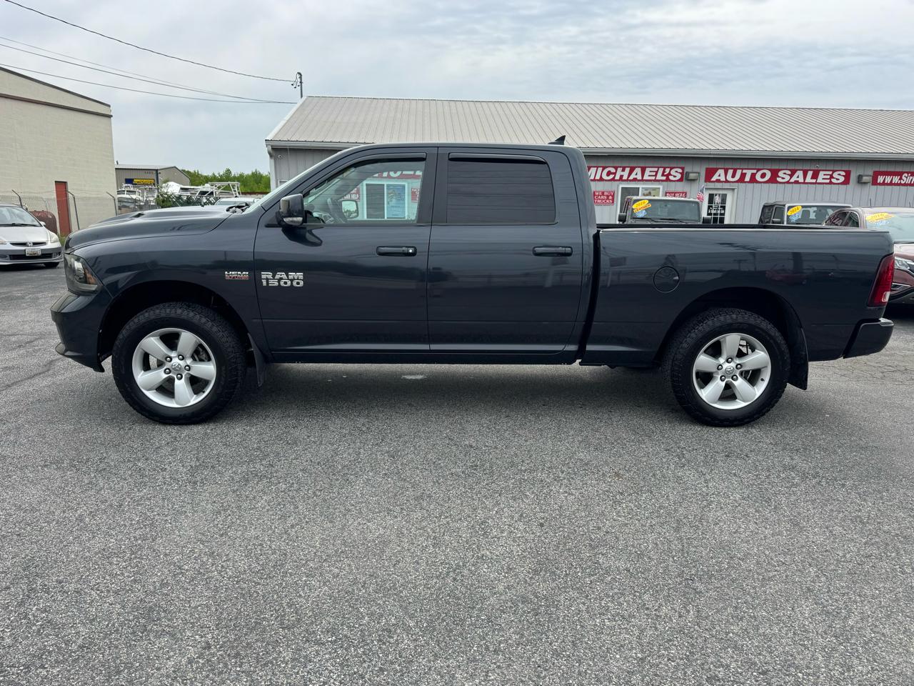 RAM 1500 4WD Crew Cab 149" Sport 2014