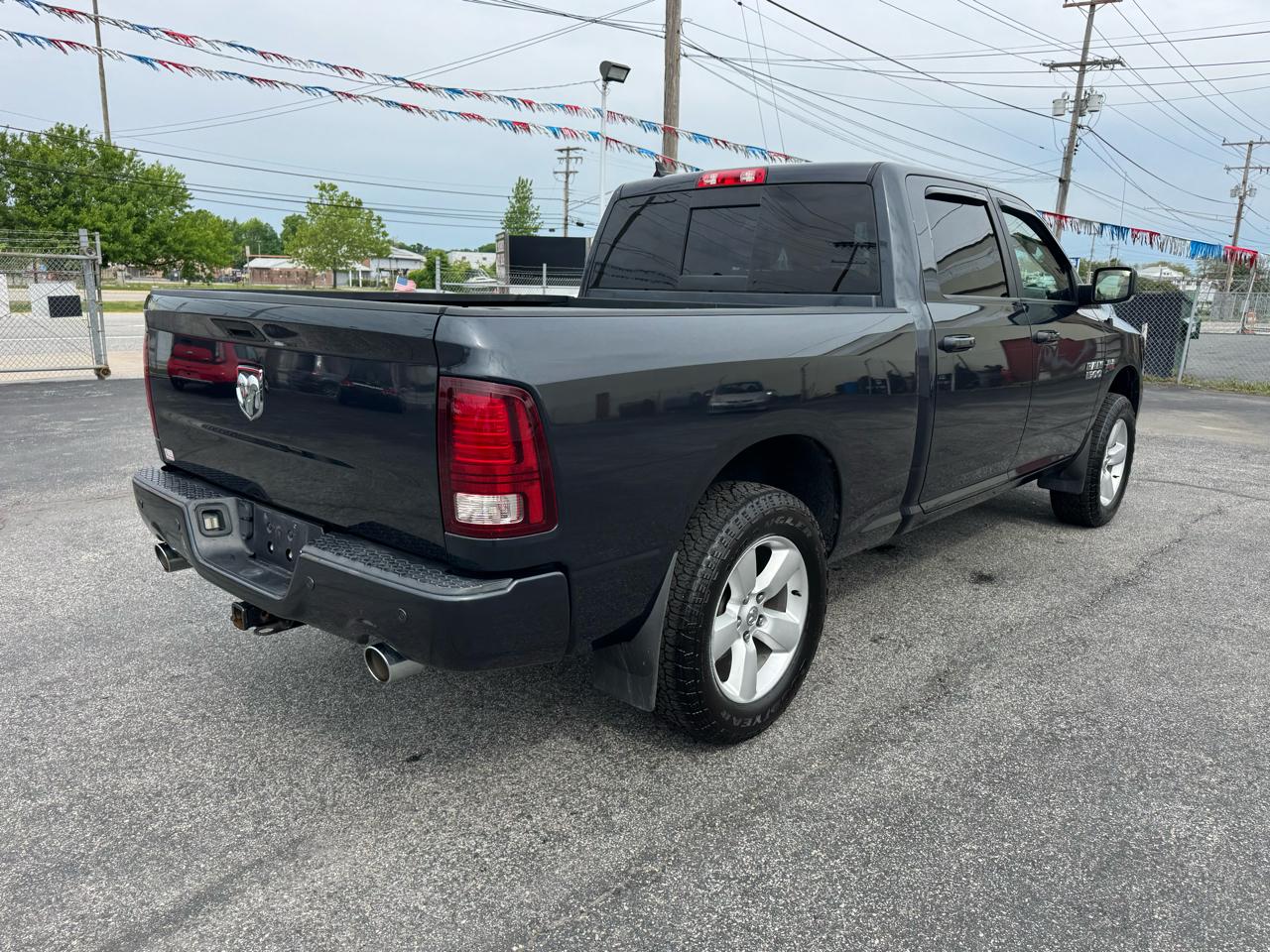 RAM 1500 4WD Crew Cab 149" Sport 2014