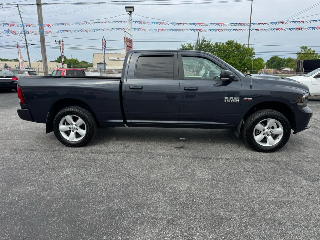 RAM 1500 4WD Crew Cab 149" Sport 2014