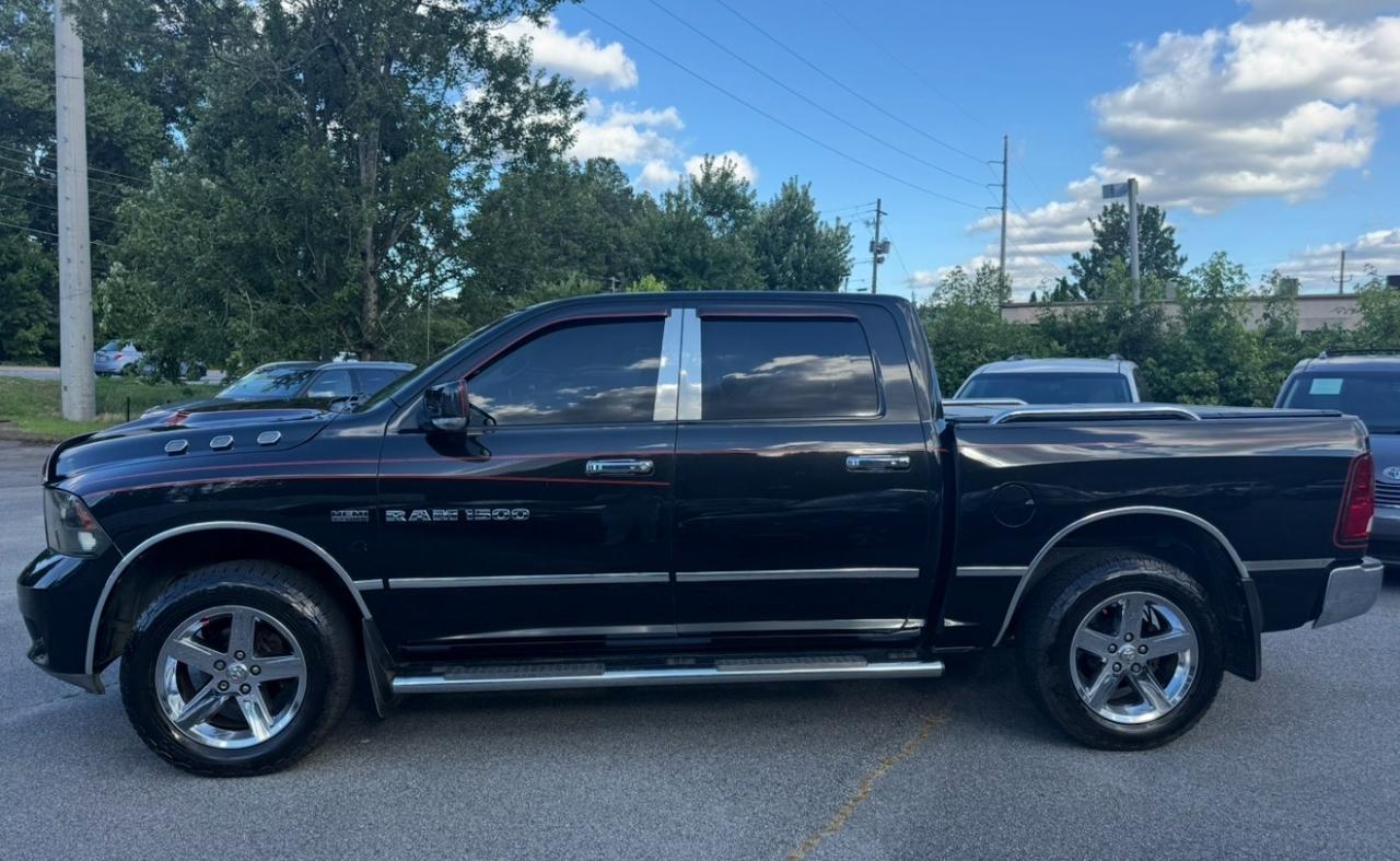 RAM 1500 4WD Crew Cab 140.5" Sport 2011