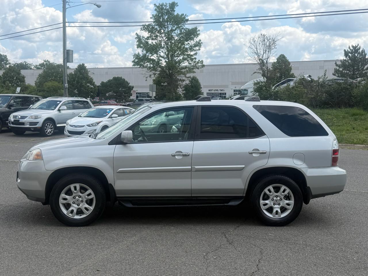 Acura MDX Touring with Navigation System and Rear DVD System 2004