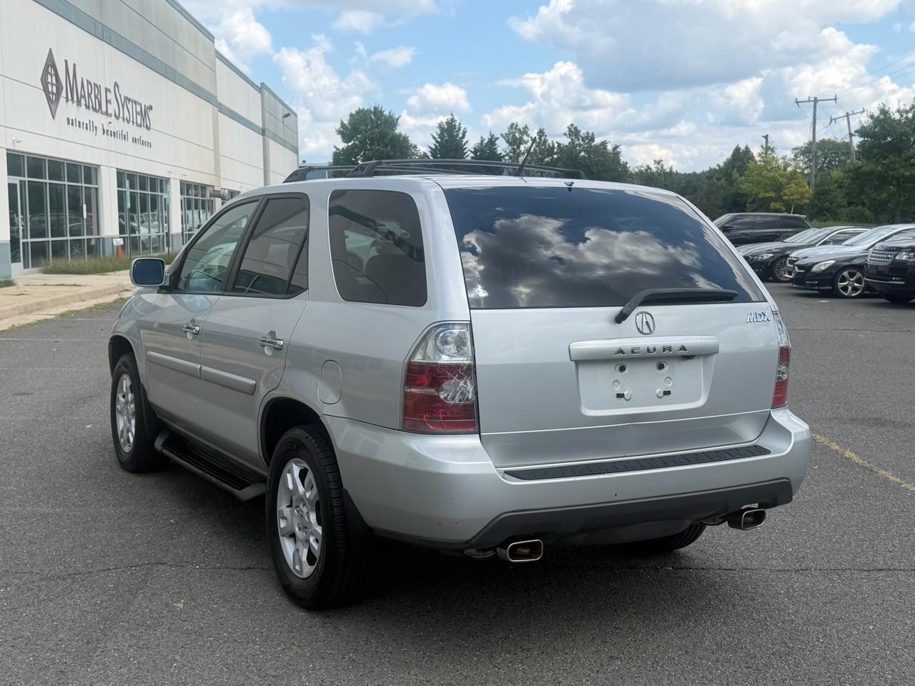 Acura MDX Touring with Navigation System and Rear DVD System 2004