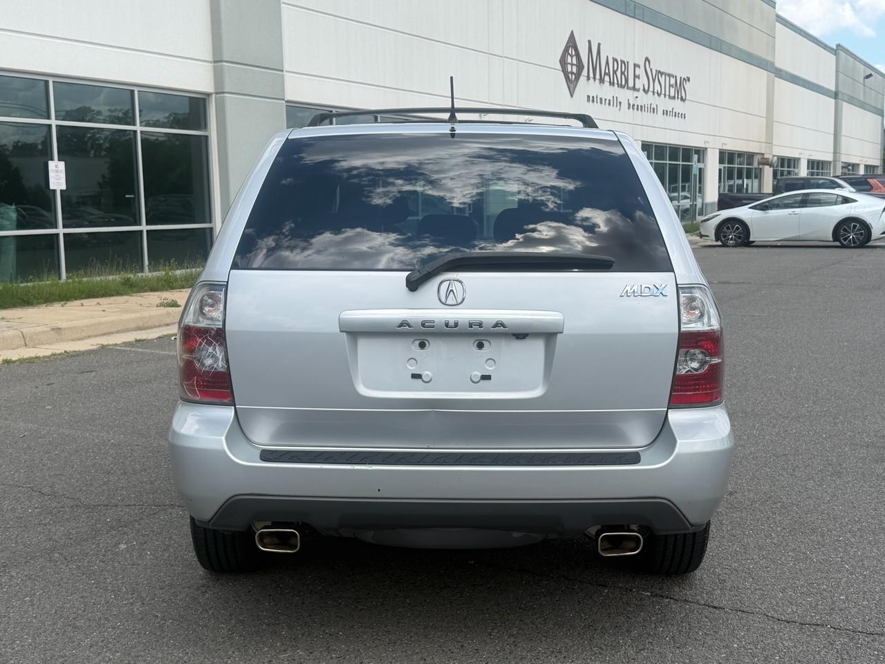 Acura MDX Touring with Navigation System and Rear DVD System 2004