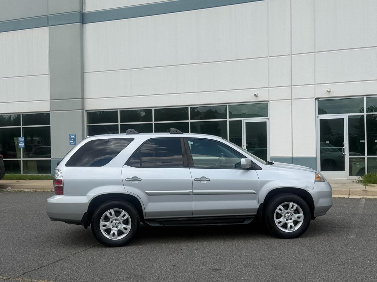 Acura MDX Touring with Navigation System and Rear DVD System 2004