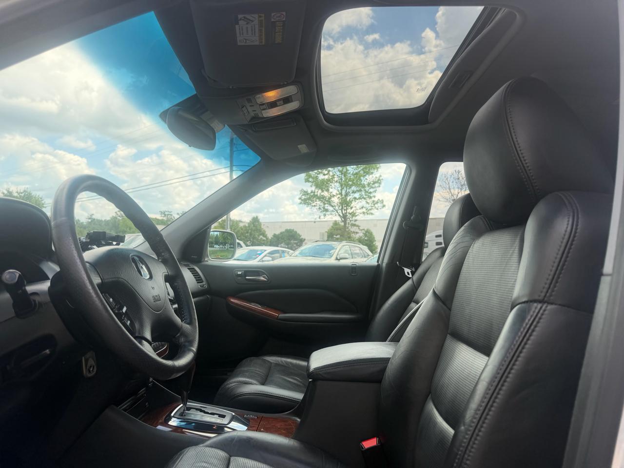 Acura MDX Touring with Navigation System and Rear DVD System 2004