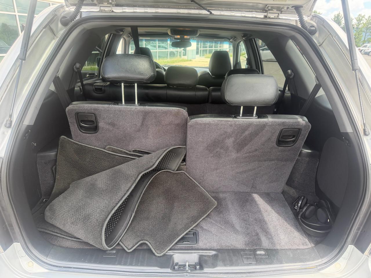 Acura MDX Touring with Navigation System and Rear DVD System 2004