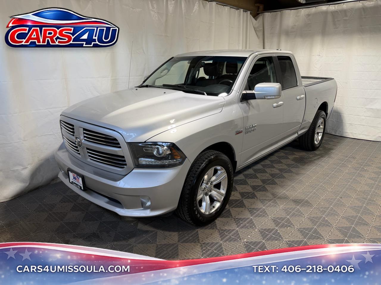 2016 RAM 1500 4WD Quad Cab 140.5" Sport