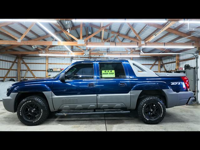 Blue 2002 Chevrolet Avalanche Pickup Truck Four-Wheel Drive Automatic