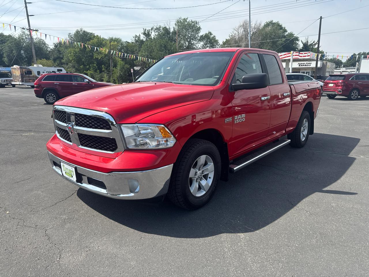 RAM 1500 4WD Quad Cab 140.5" SLT 2017
