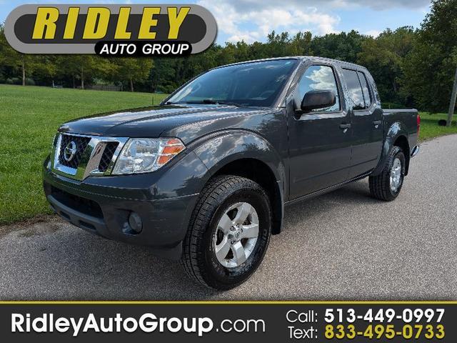 Gray 2012 Nissan Frontier Pickup Truck Four-Wheel Drive 6-Speed Manual
