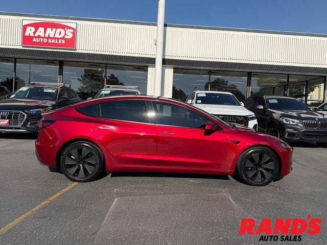 Red 2024 Tesla Model 3 Sedan All-Wheel Drive Automatic