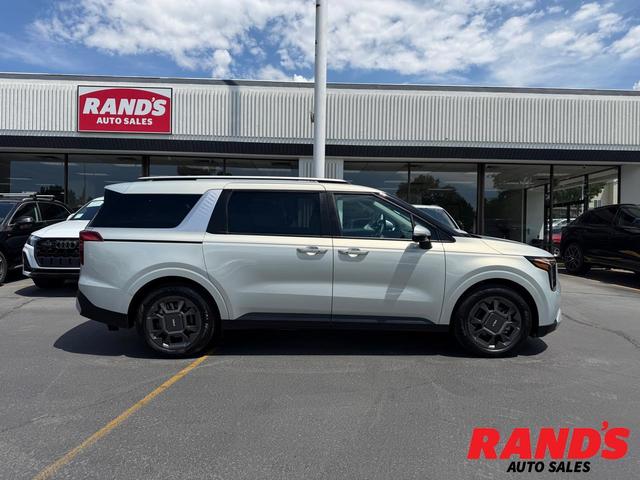 Silver 2025 Kia Carnival Hybrid Minivan Front-Wheel Drive Automatic