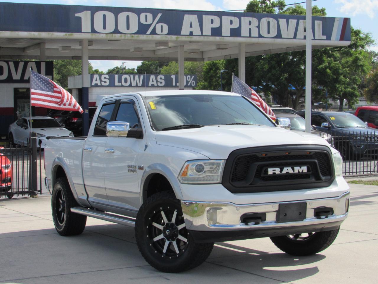 RAM 1500 4WD Quad Cab 140.5" Laramie 2014