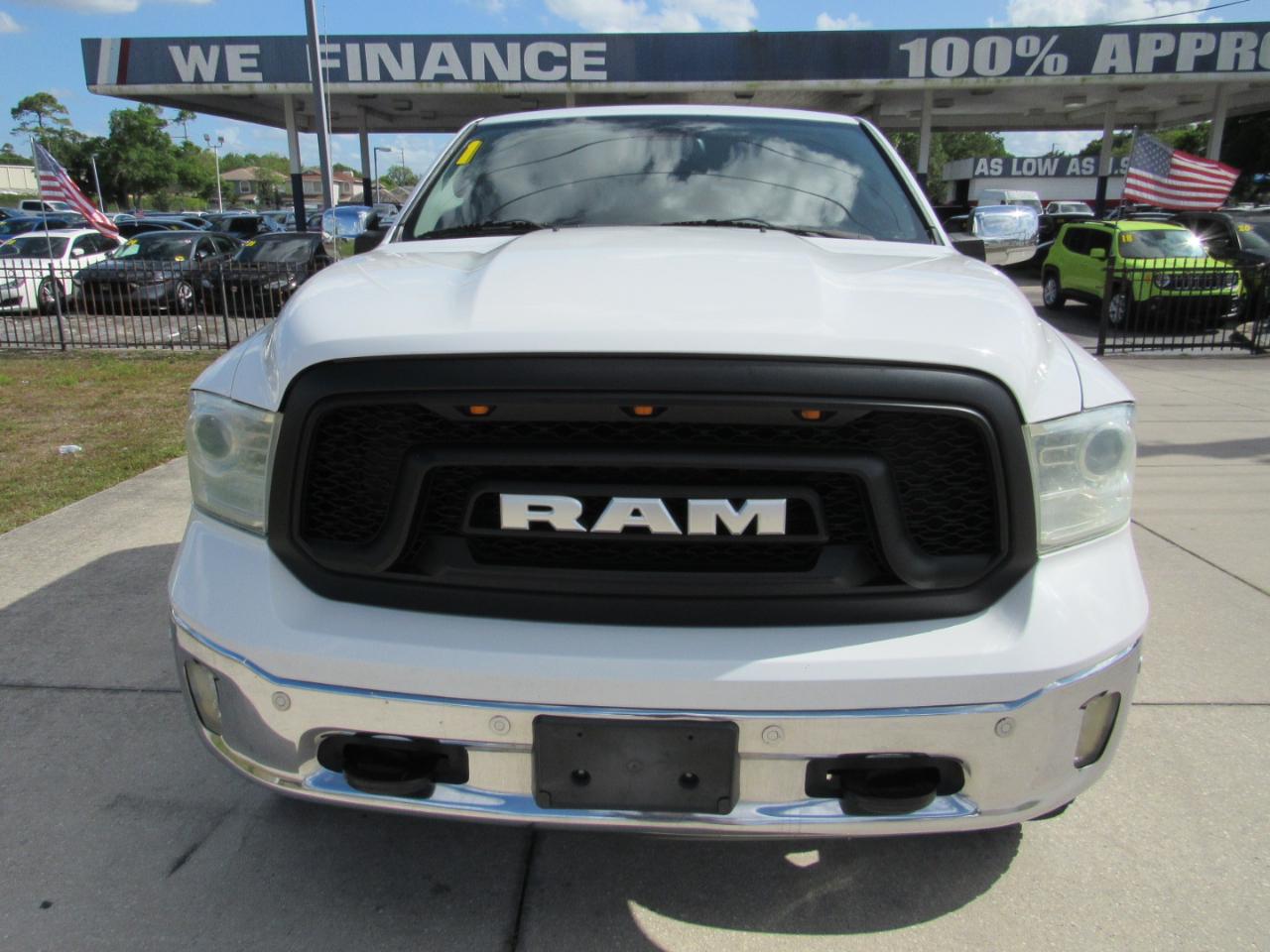 RAM 1500 4WD Quad Cab 140.5" Laramie 2014