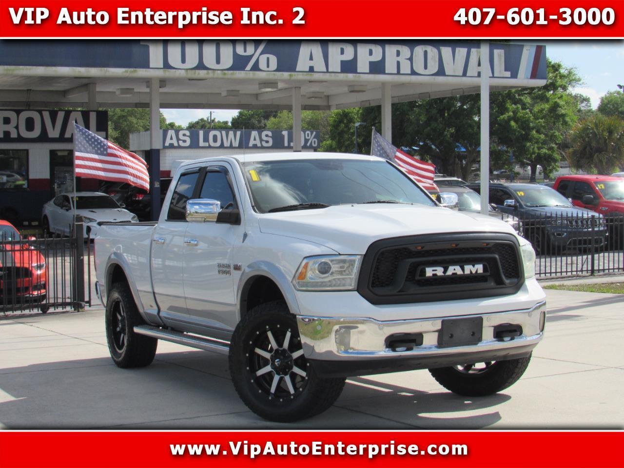 2014 RAM 1500 4WD Quad Cab 140.5" Laramie
