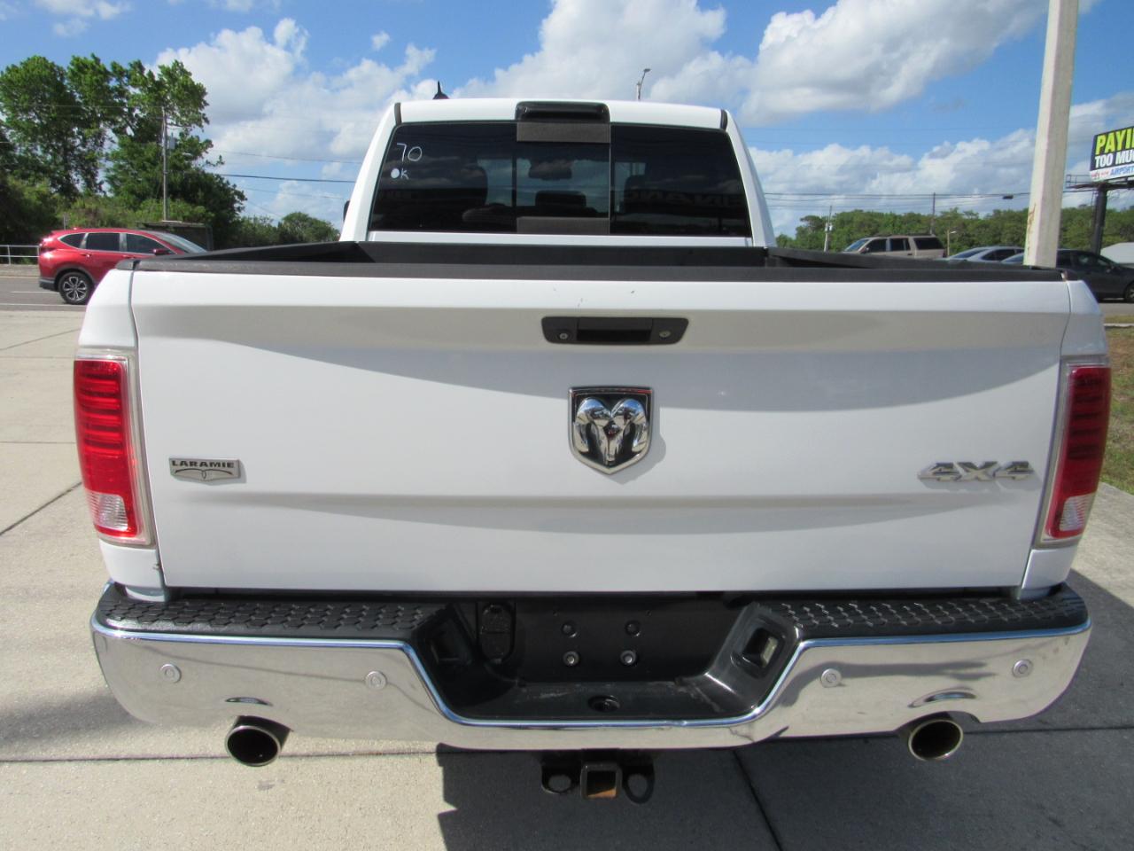 RAM 1500 4WD Quad Cab 140.5" Laramie 2014