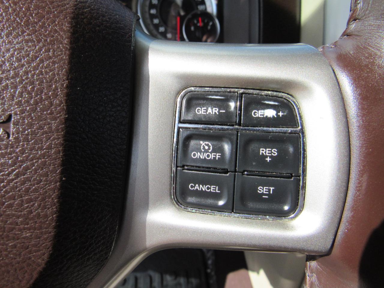 RAM 1500 4WD Quad Cab 140.5" Laramie 2014