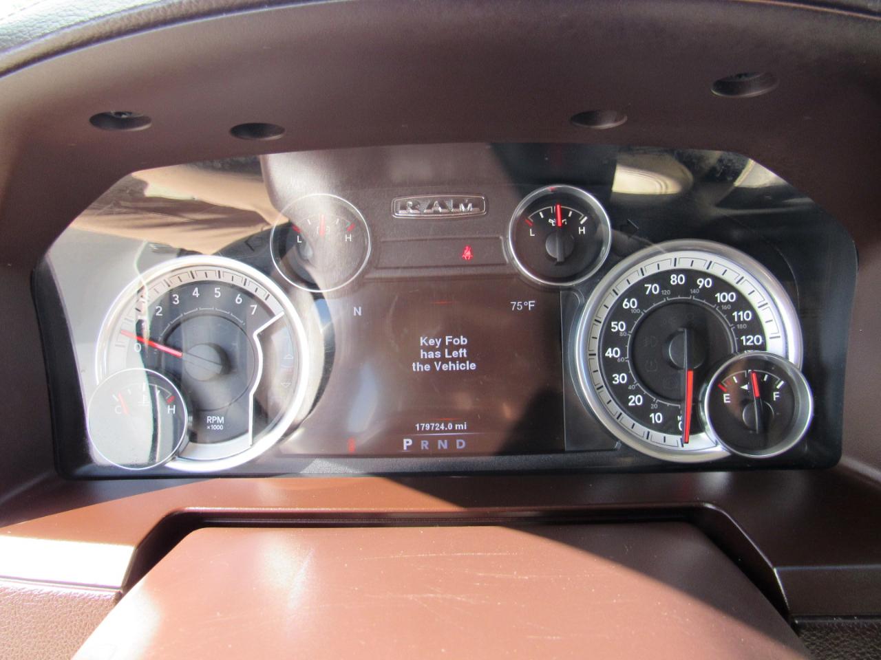 RAM 1500 4WD Quad Cab 140.5" Laramie 2014