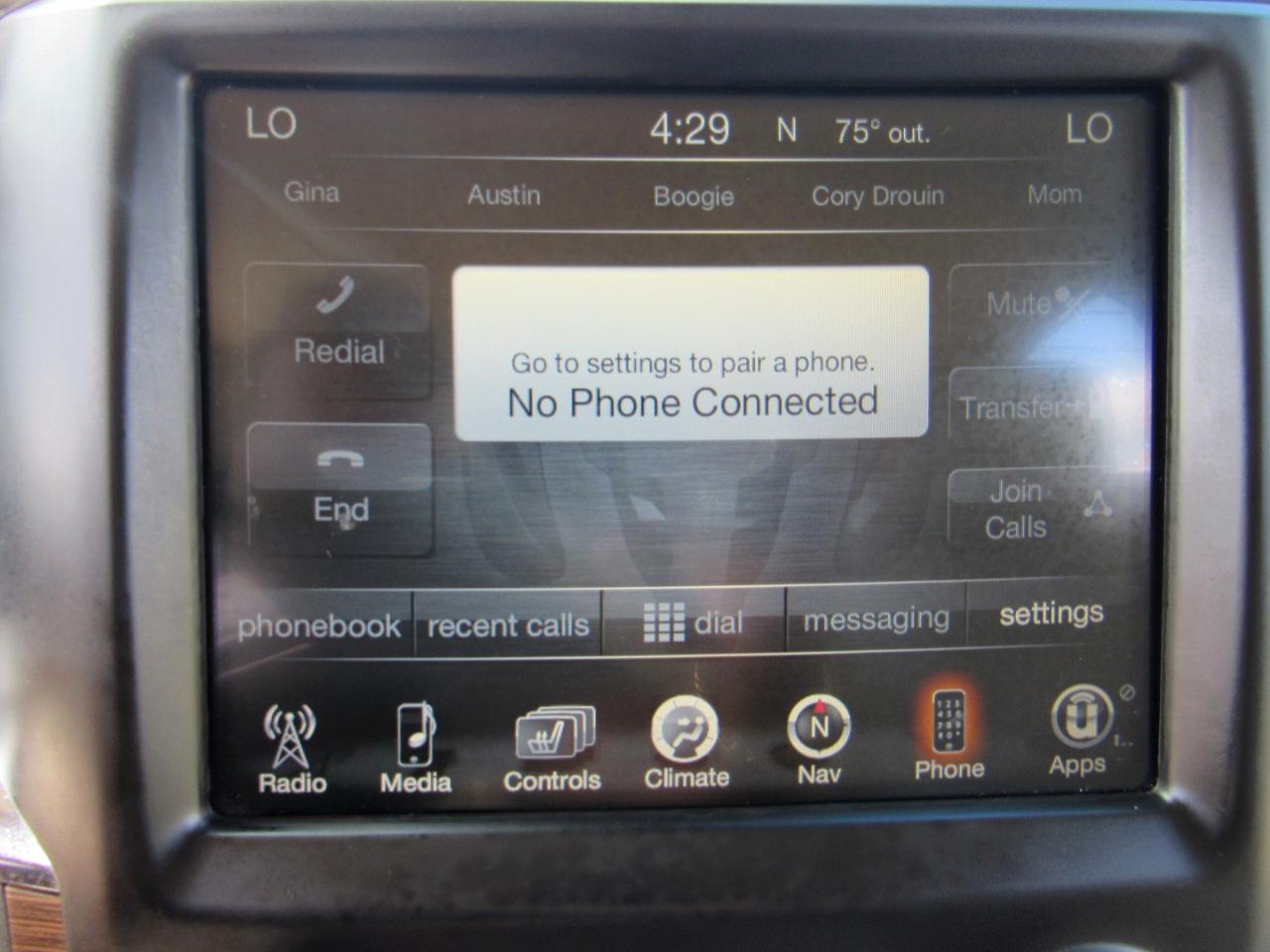 RAM 1500 4WD Quad Cab 140.5" Laramie 2014