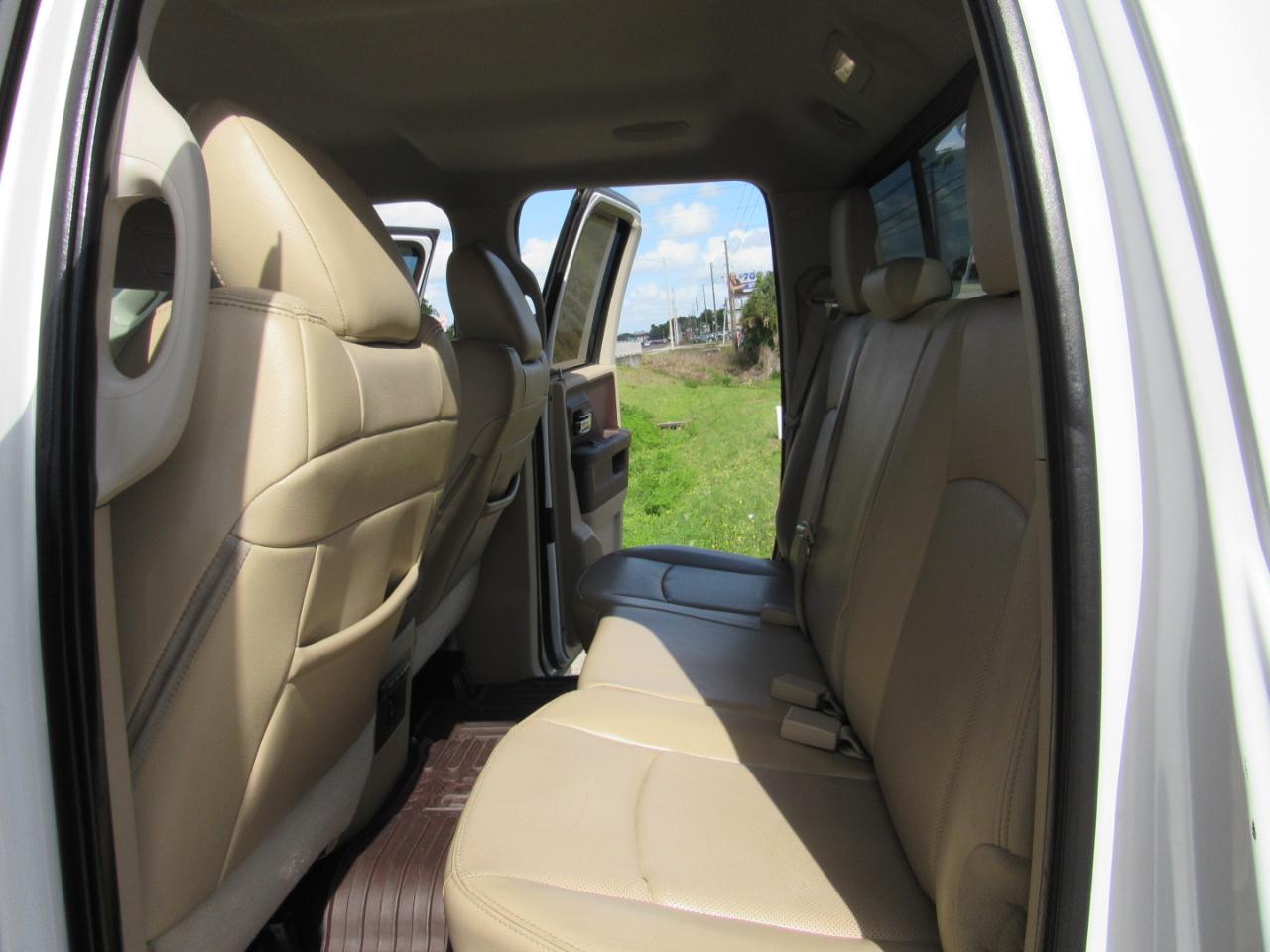 RAM 1500 4WD Quad Cab 140.5" Laramie 2014