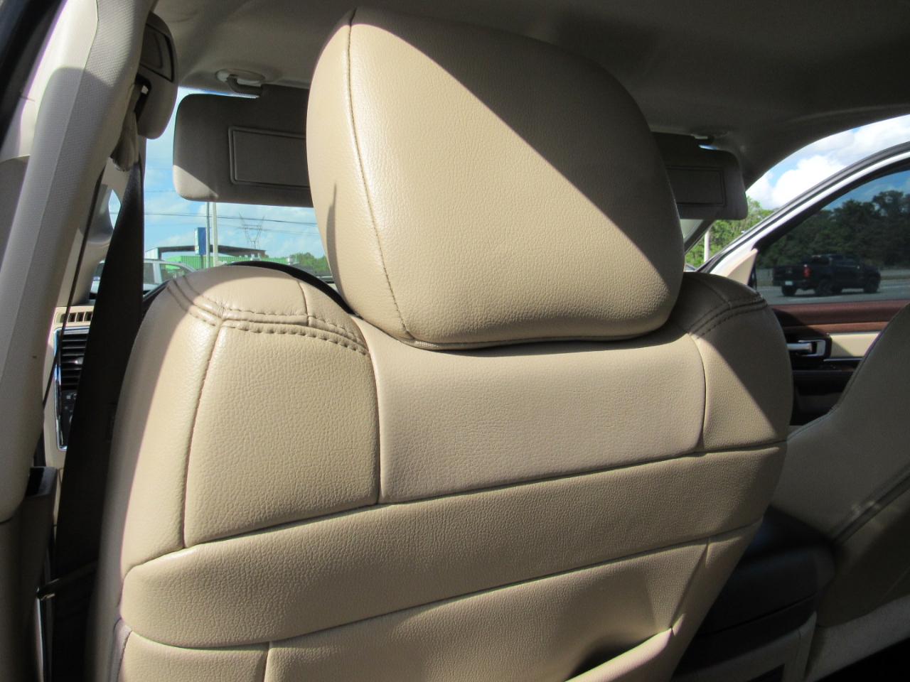 RAM 1500 4WD Quad Cab 140.5" Laramie 2014