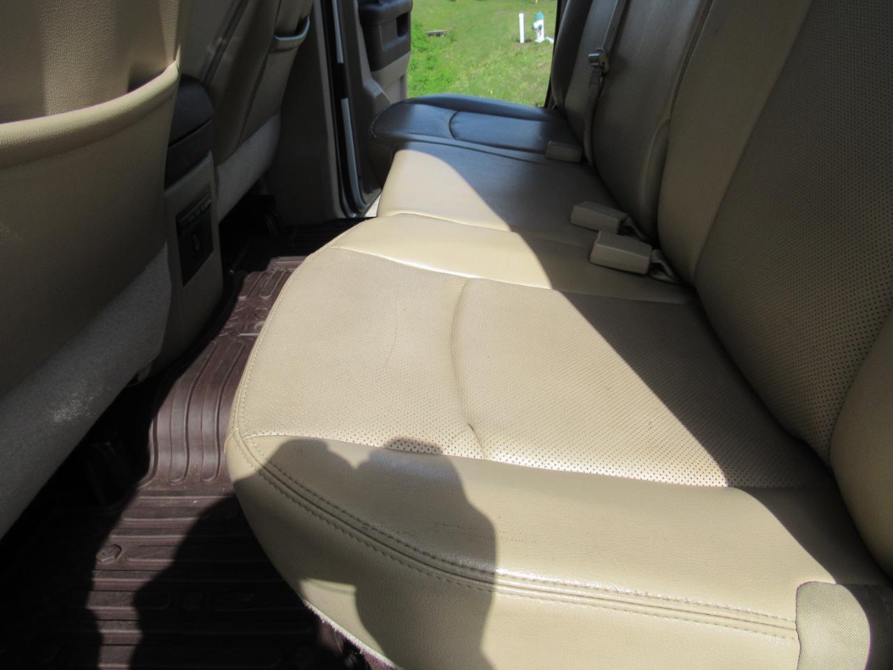 RAM 1500 4WD Quad Cab 140.5" Laramie 2014