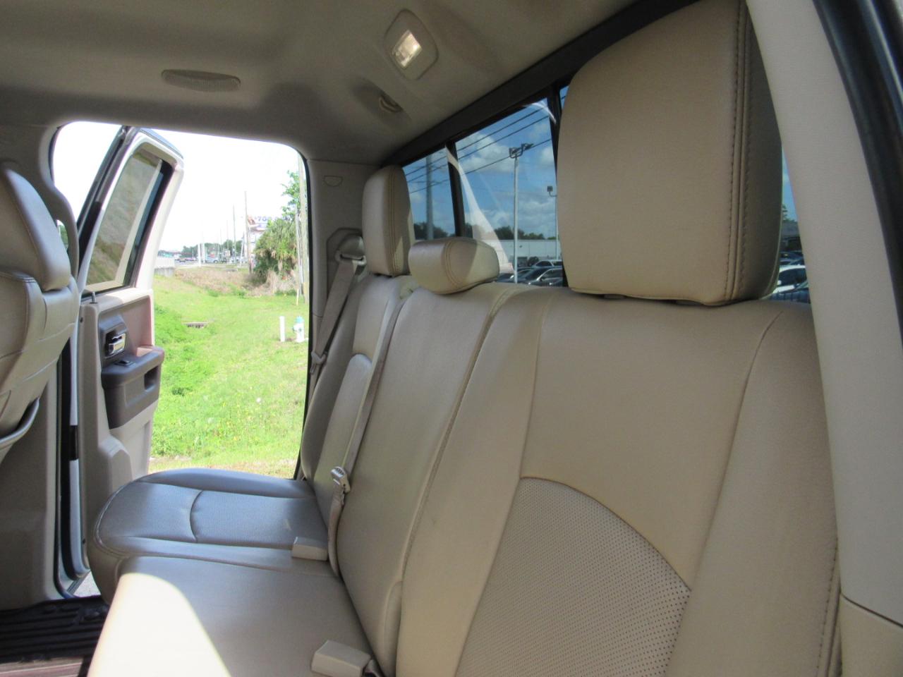 RAM 1500 4WD Quad Cab 140.5" Laramie 2014