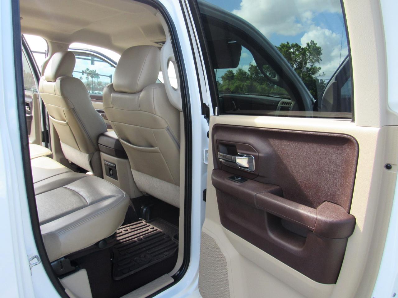 RAM 1500 4WD Quad Cab 140.5" Laramie 2014