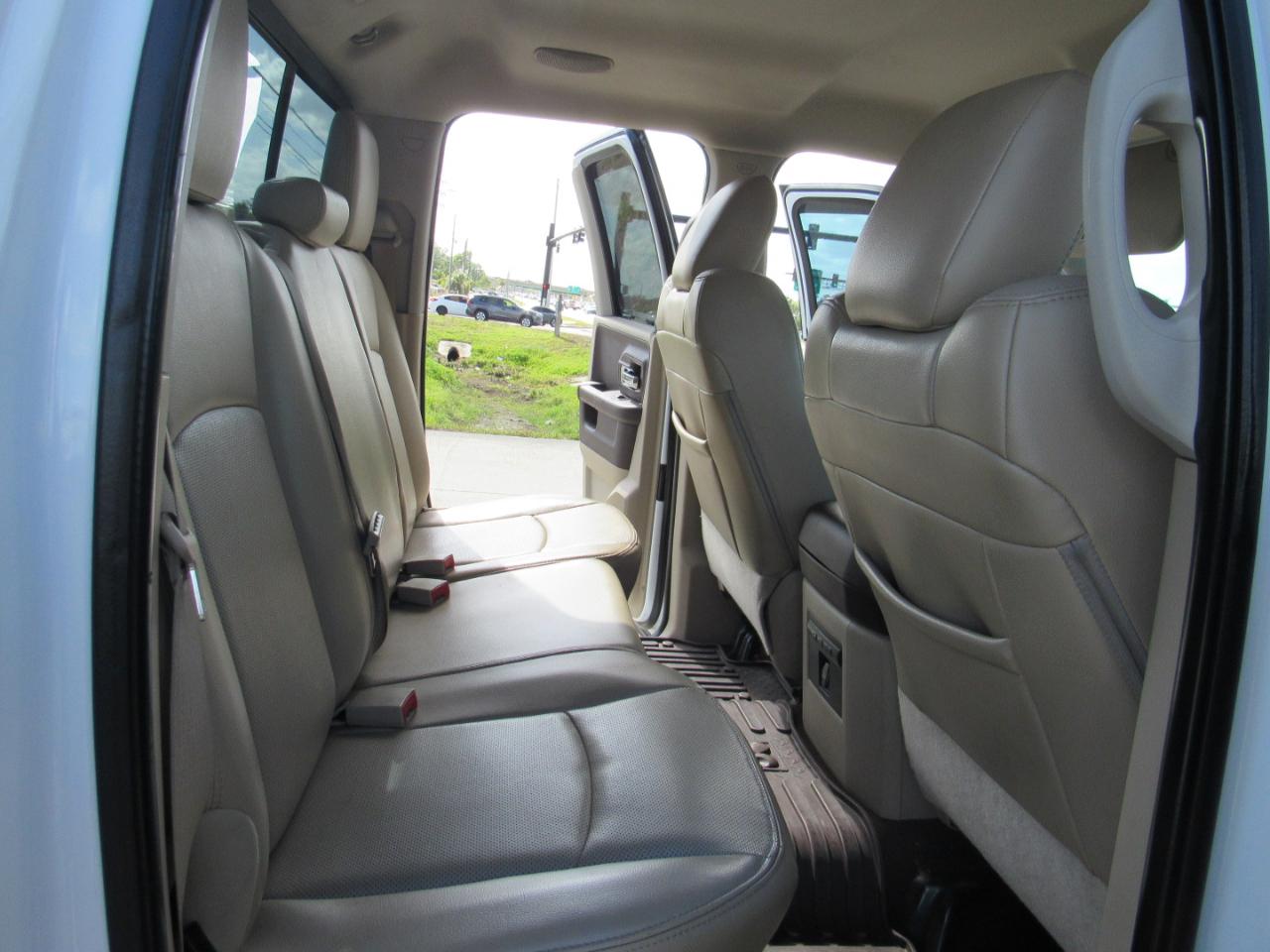 RAM 1500 4WD Quad Cab 140.5" Laramie 2014