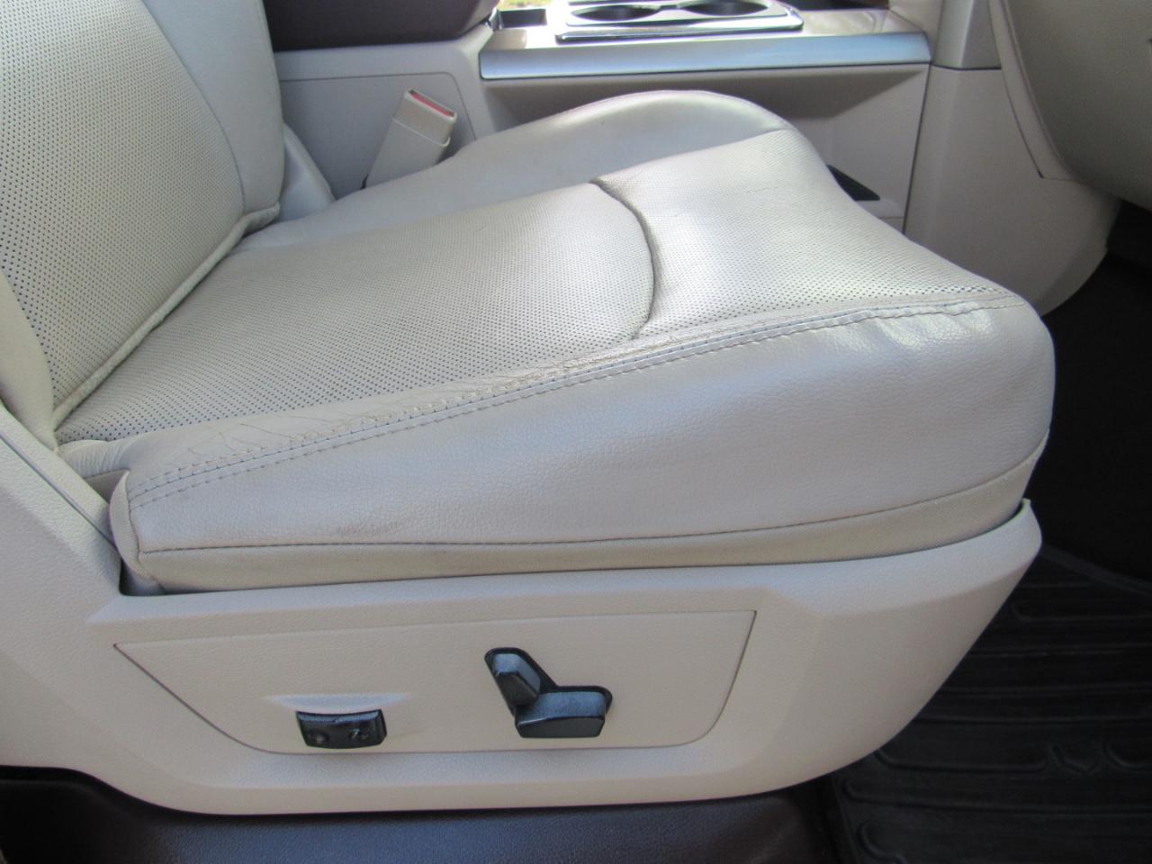 RAM 1500 4WD Quad Cab 140.5" Laramie 2014