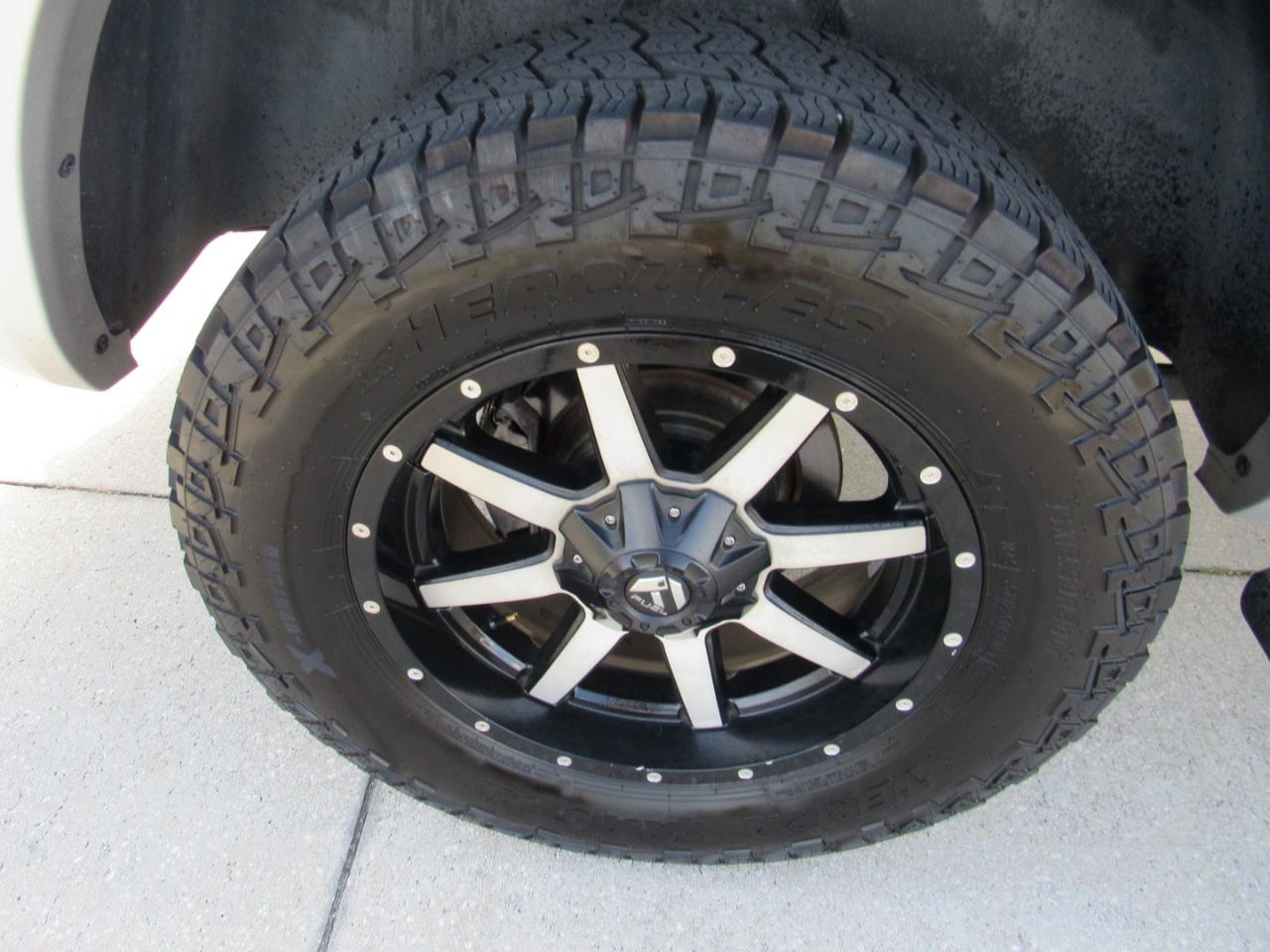 RAM 1500 4WD Quad Cab 140.5" Laramie 2014