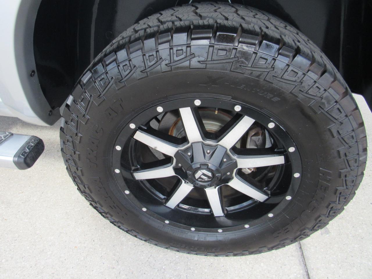 RAM 1500 4WD Quad Cab 140.5" Laramie 2014