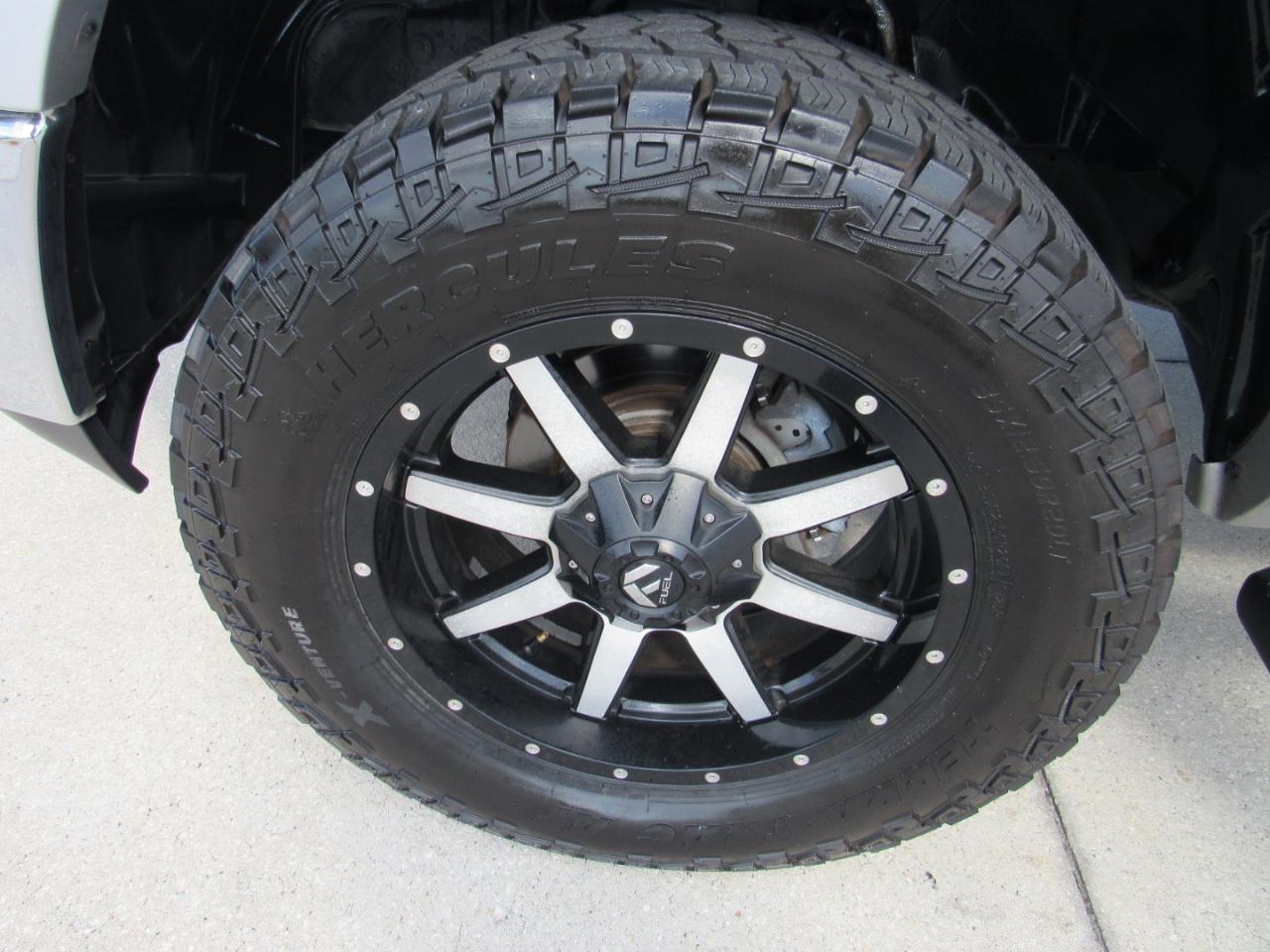 RAM 1500 4WD Quad Cab 140.5" Laramie 2014