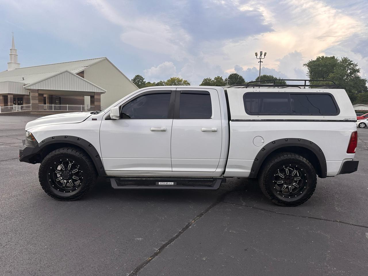 2010 RAM 1500 4WD Quad Cab 140.5" SLT