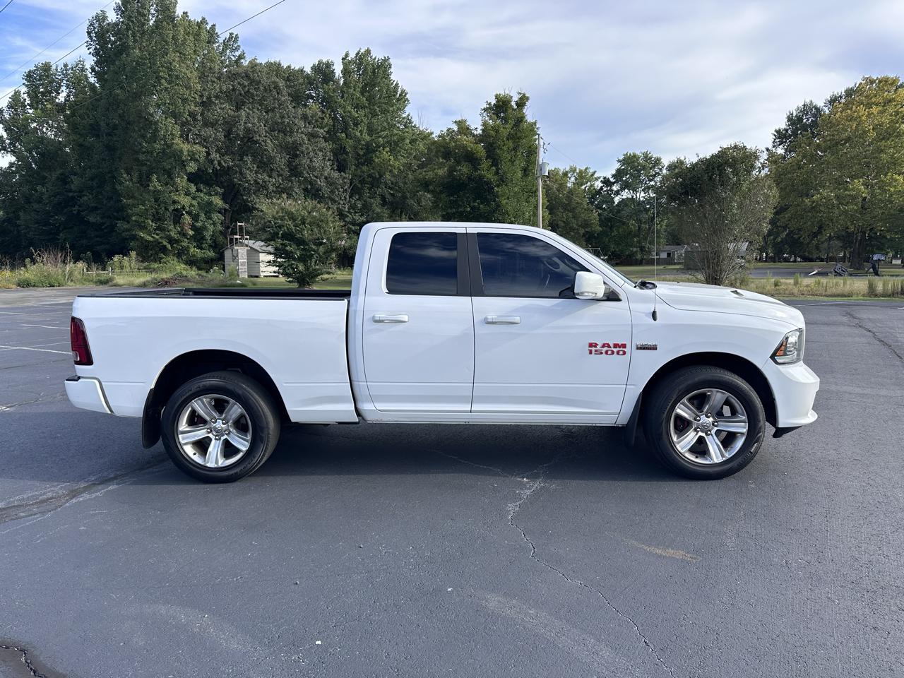 RAM 1500 4WD Quad Cab 140.5" Sport 2015