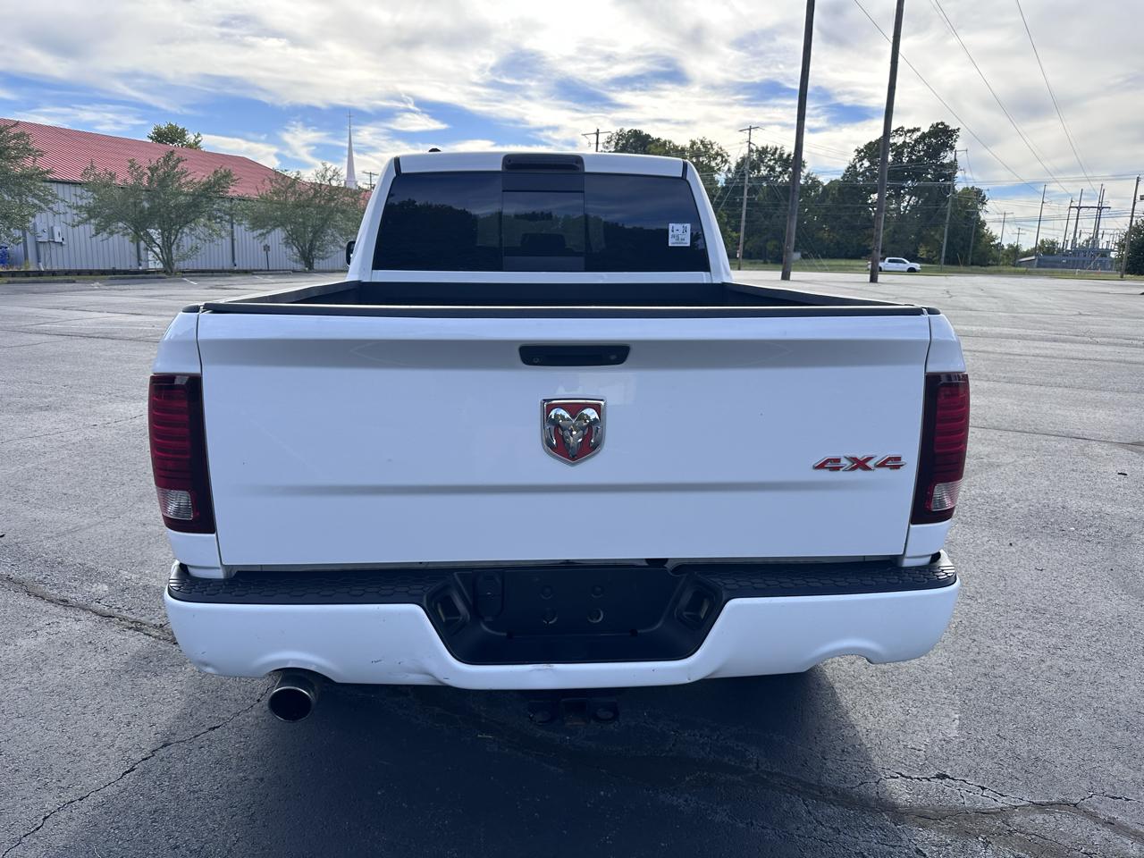 RAM 1500 4WD Quad Cab 140.5" Sport 2015