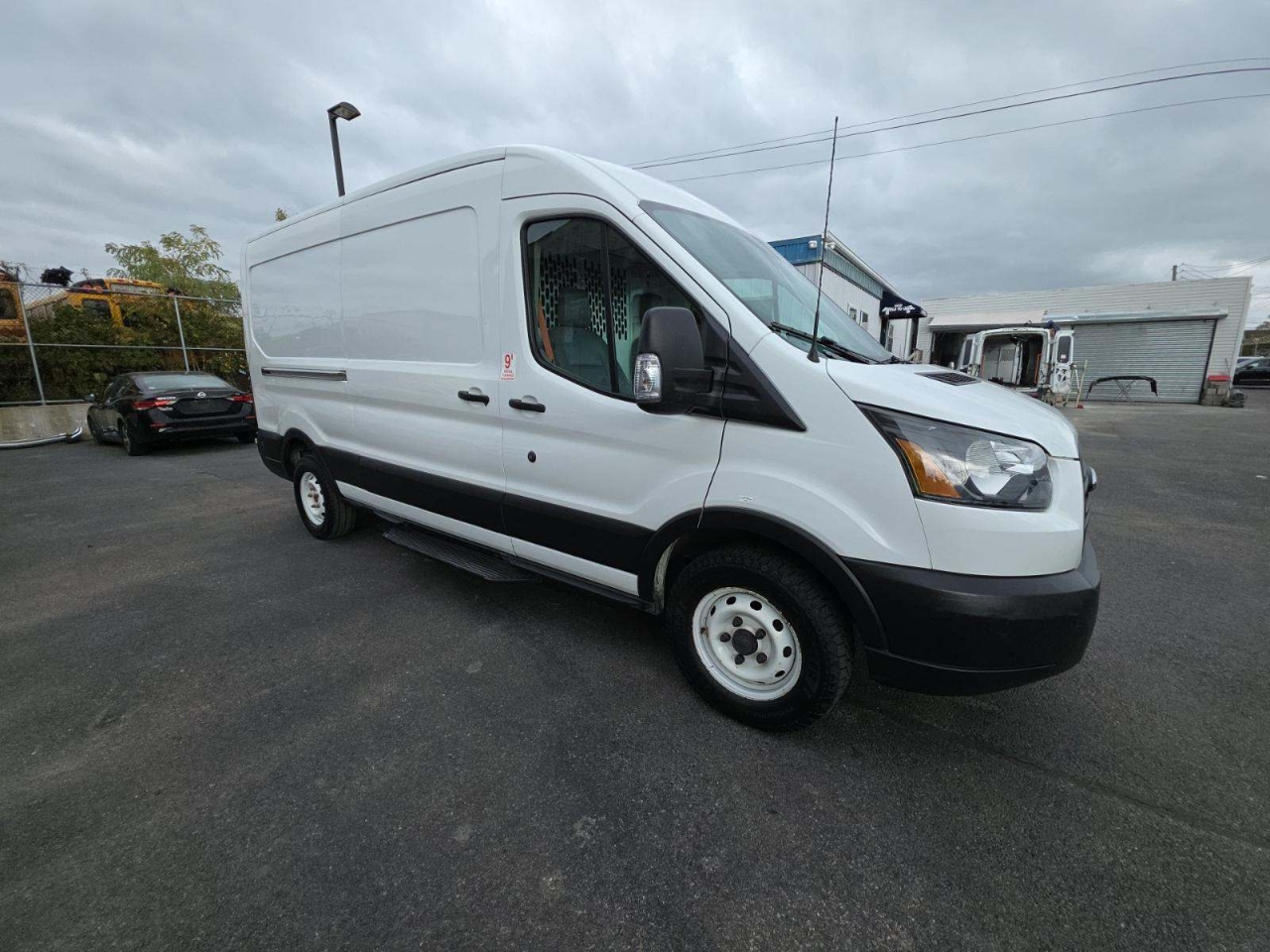 Ford Transit 150 Van Med. Roof w/Sliding Pass. 148-in. WB 2019