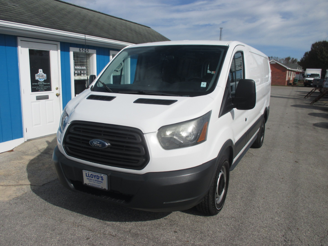 2015 Ford Transit Cargo Van T-150 130" Low Rf 8600 GVWR Swing-Out RH Dr