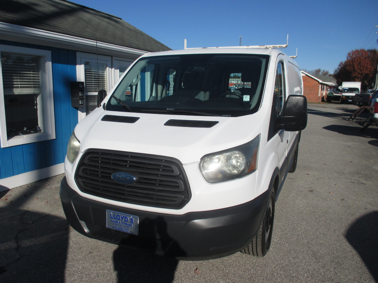 2015 Ford Transit Cargo Van T-150 130" Low Rf 8600 GVWR Swing-Out RH Dr