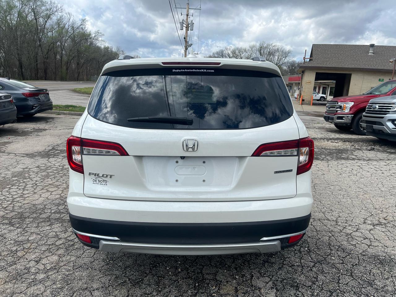 View vehicle photo 4