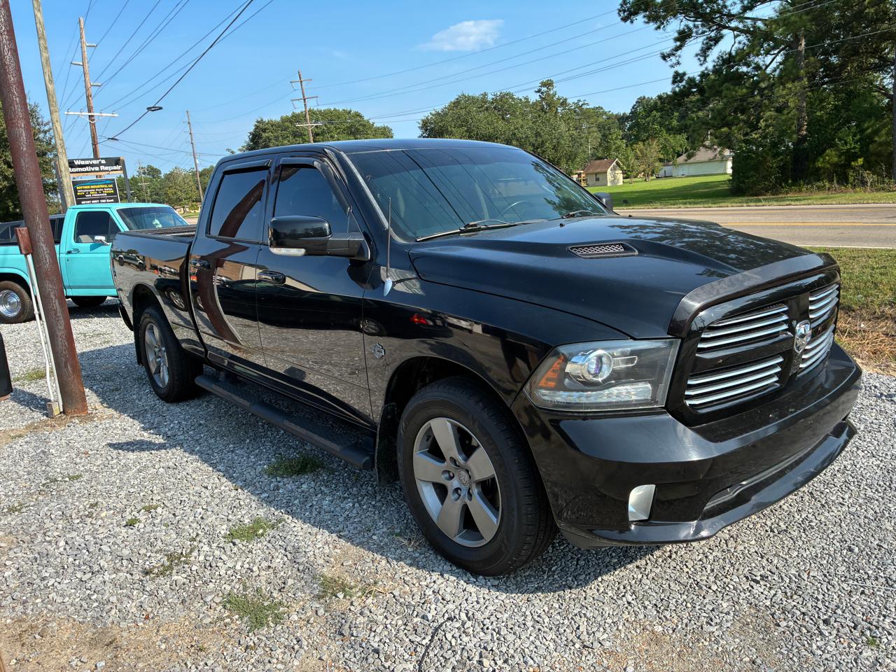 RAM 1500 4WD Crew Cab 140.5" Sport 2014