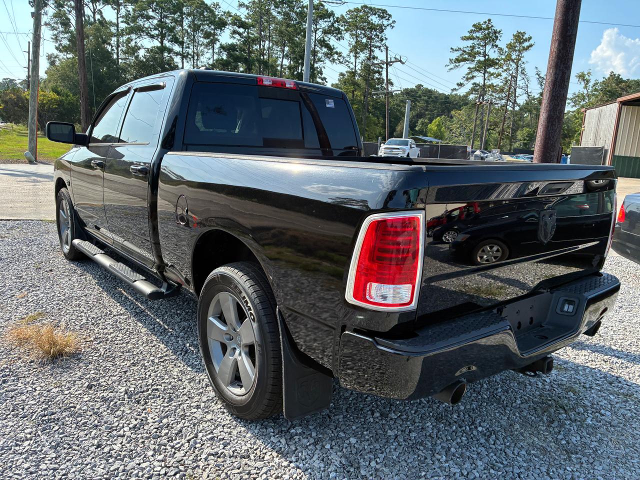 RAM 1500 4WD Crew Cab 140.5" Sport 2014