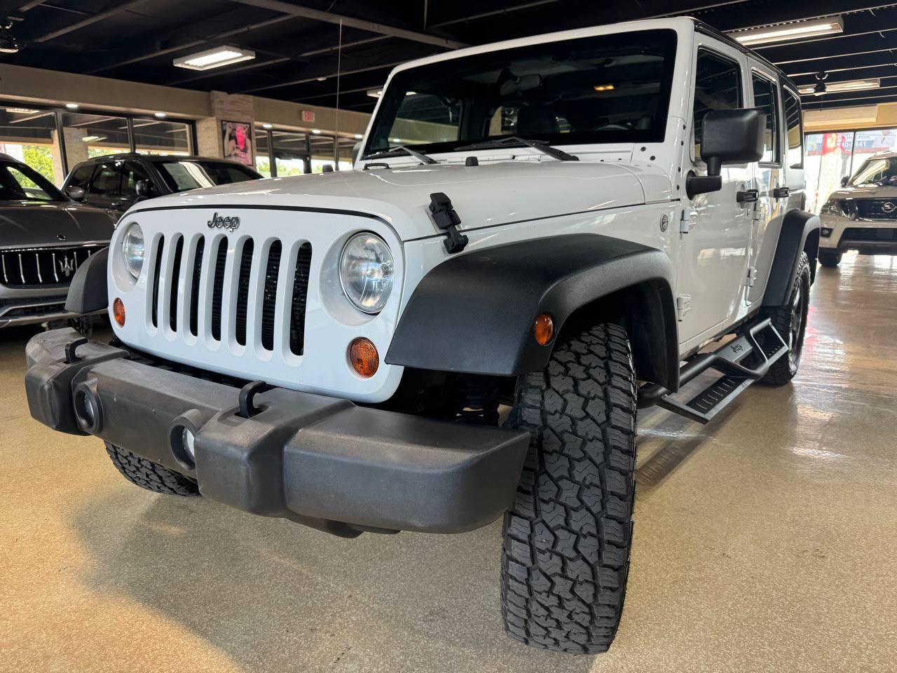 Jeep Wrangler Unlimited 4WD 4dr Sport 2012
