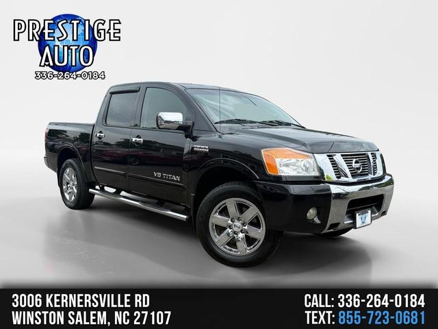 Black 2010 Nissan Titan Pickup Truck Four-Wheel Drive Automatic