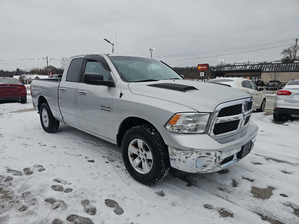 RAM 1500 4WD Quad Cab 140.5" SLT 2016