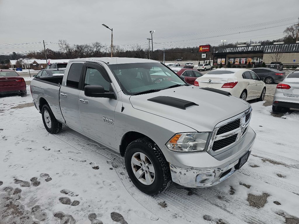 RAM 1500 4WD Quad Cab 140.5" SLT 2016