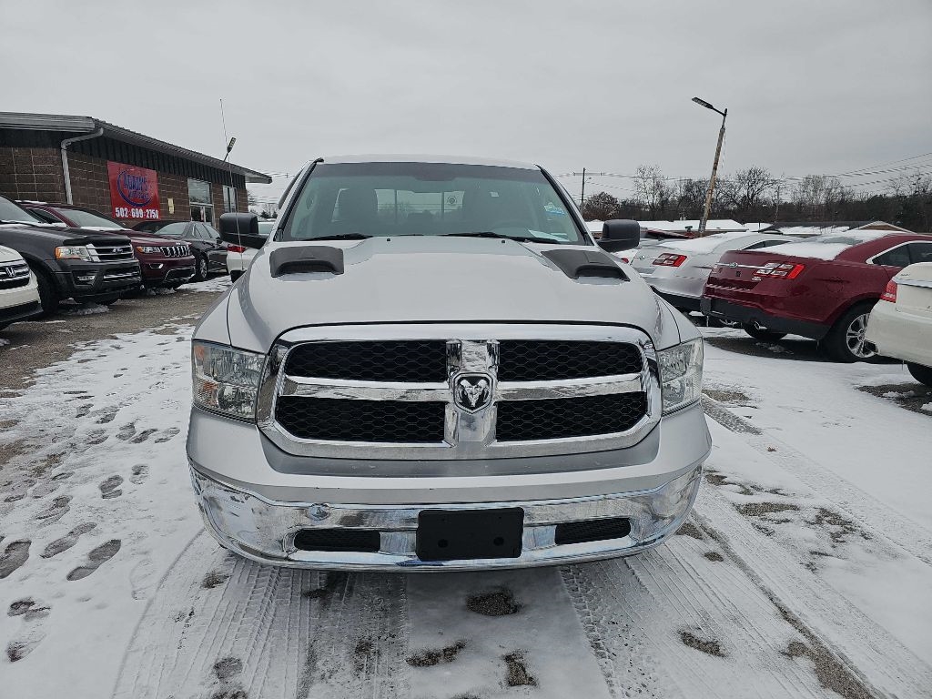 RAM 1500 4WD Quad Cab 140.5" SLT 2016