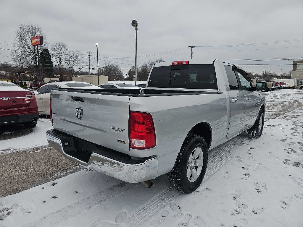 RAM 1500 4WD Quad Cab 140.5" SLT 2016