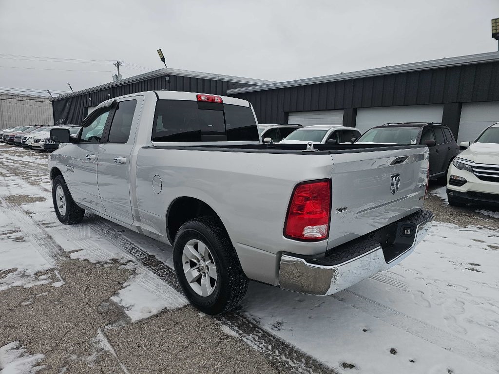 RAM 1500 4WD Quad Cab 140.5" SLT 2016