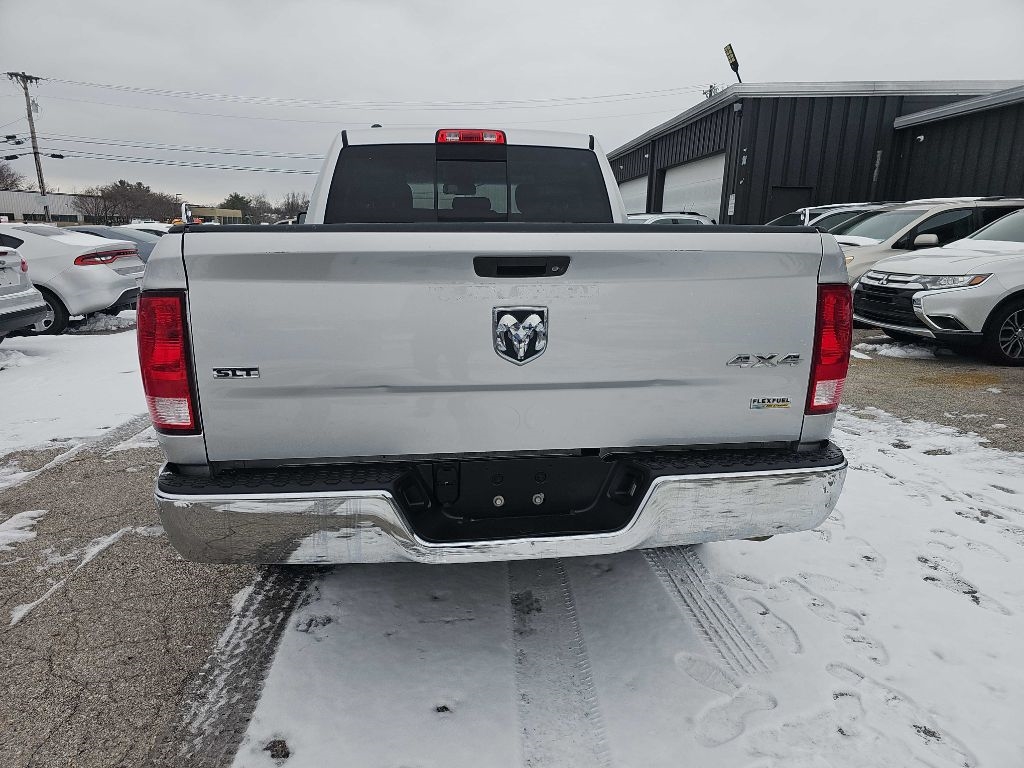 RAM 1500 4WD Quad Cab 140.5" SLT 2016